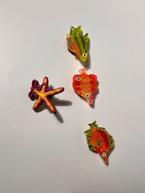 Quacker Factory assorted button covers.